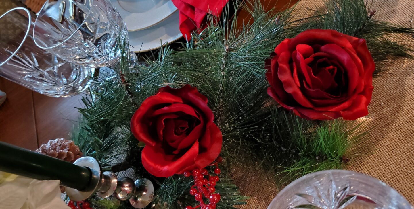 Two Red Roses And Two Crystal Glasses